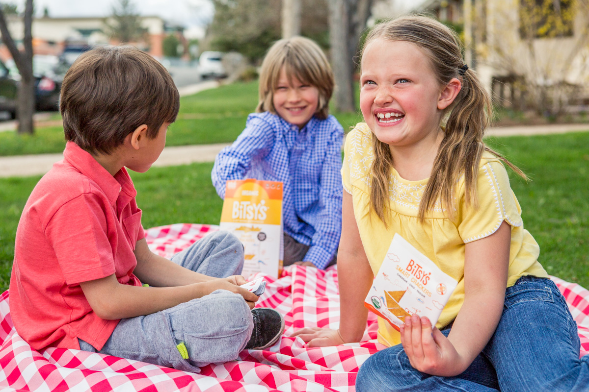 Kids love to snack on crackers with friends. Photographs were made in Boulder, Colorado by Julia Vandenoever.