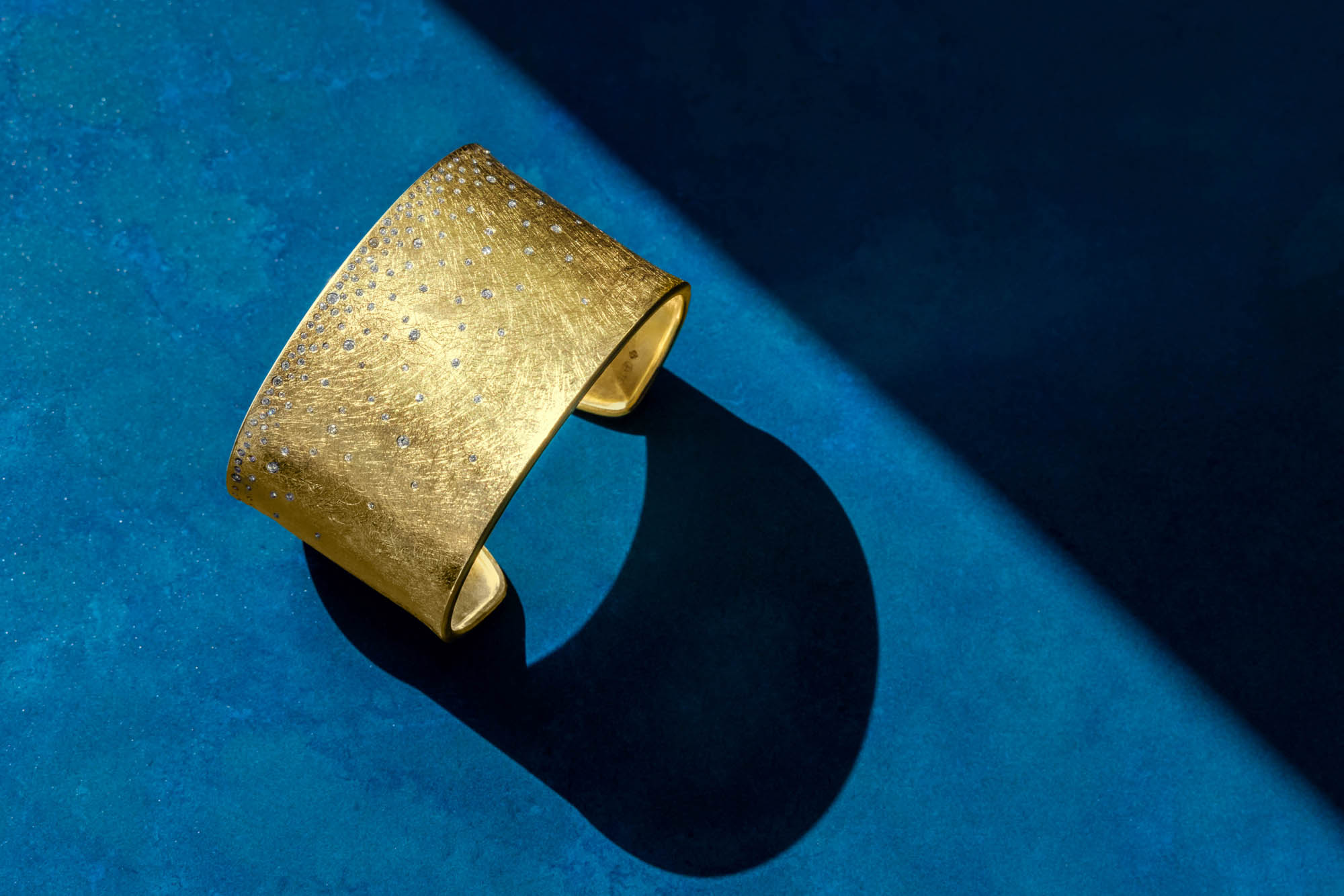 Todd Reed, Boulder jewelry designer, makes stunning beautiful pieces and photography by Colorado photographer Julia Vandeneover. 