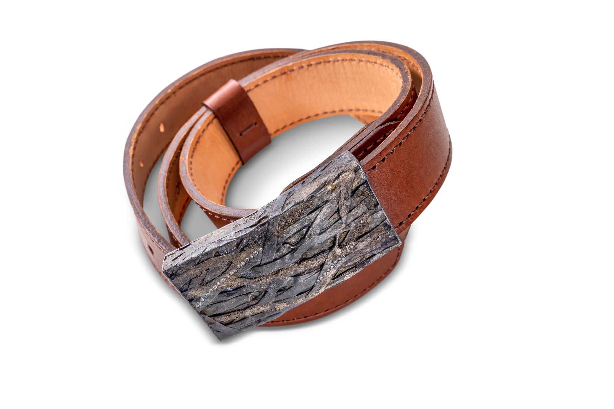 Todd Reed, Boulder jewelry designer, makes stunning beautiful pieces and photography by Colorado photographer Julia Vandeneover. 